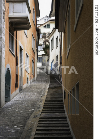 Street alley with stairs and colorful buildings in Street alley with stairs and colorful buildings in 62713103
