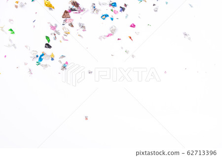 Multicolored confetti on white background. Multicolored confetti on white background. 62713396