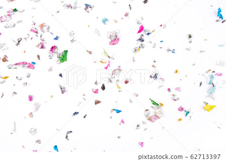 Multicolored confetti on white background. Multicolored confetti on white background. 62713397