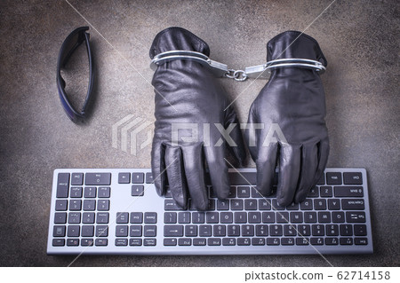 Black gloves in handcuffs 62714158