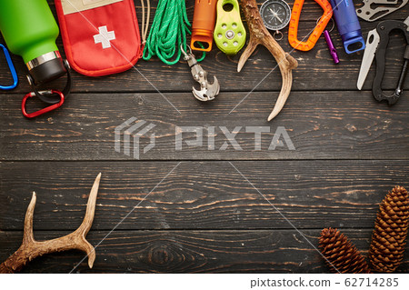 Travel items for hiking over wooden background Travel items for hiking over wooden background 62714285