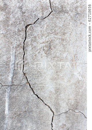 cracked stone wall background 62718656