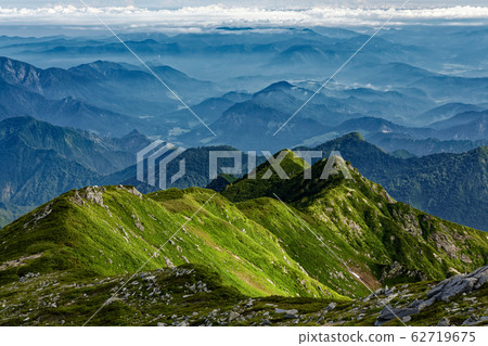 Daigra ridge and morning mountains seen from Iide Motoyama Daigra ridge and morning mountains seen from Iide Motoyama 62719675
