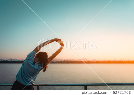 Woman is relax standing after run. 62721768