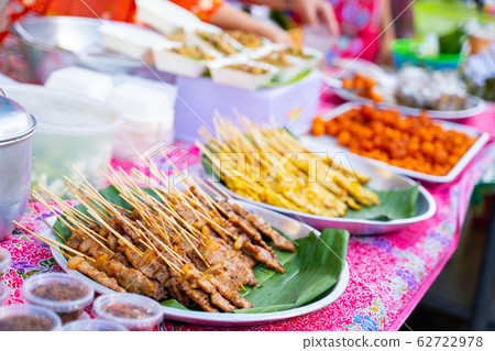 grilled skewers street food in local market in 62722978