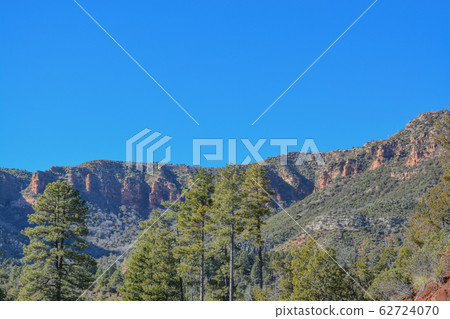 The Mogollon Rim mountain range in Tonto National Forest. Near Payson, Gila County, Arizona USA The Mogollon Rim mountain range in Tonto National Forest. Near Payson, Gila County, Arizona USA 62724070