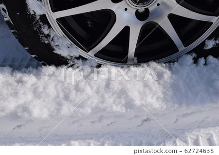 Studless tires on snowy roads 62724638