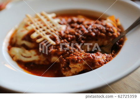 Homemade Beef Meat lasagna on dish in restaurant , Italian food Homemade Beef Meat lasagna on dish in restaurant , Italian food 62725359