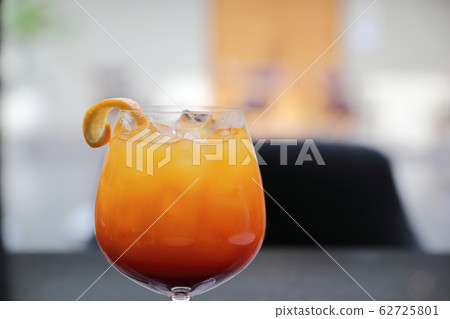Sunrise Cocktail orange pineapple juice in restaurant 62725801
