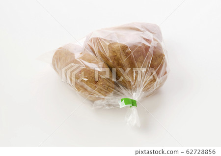 Crimson potato with soil bag Crimson potato with soil bag 62728856