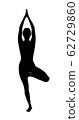 Black silhouette of woman doing yoga exercise. 62729860