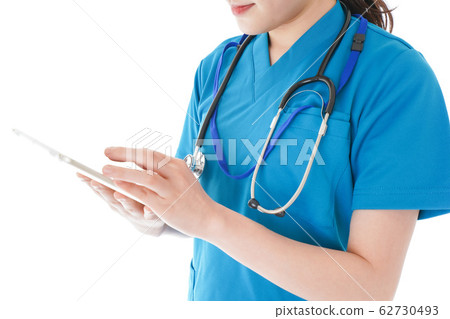 Smiling young female nurse Smiling young female nurse 62730493