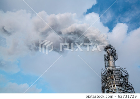 Smoking pipe against the sky in modern Smoking pipe against the sky in modern 62731729