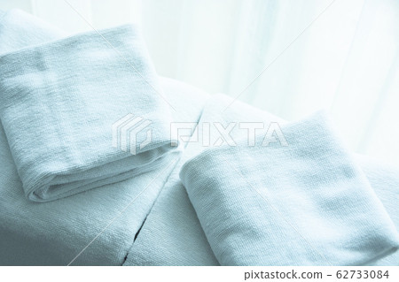 white towel on white mattress fabric, soft light white towel on white mattress fabric, soft light 62733084