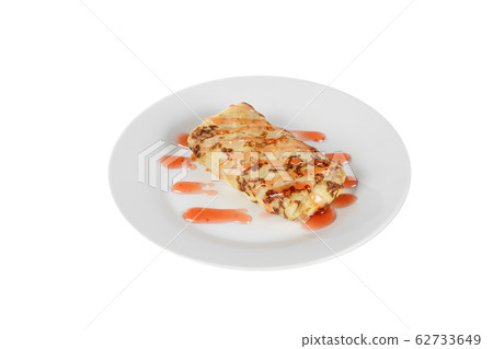 Pancake stuffed with berry topping, isolated Pancake stuffed with berry topping, isolated 62733649