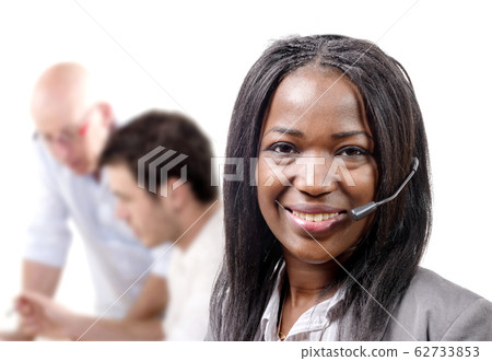 Portrait of smiling cheerful african support phone Portrait of smiling cheerful african support phone 62733853