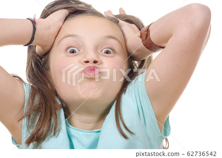 pre-teen girl make funny faces, isolated on white pre-teen girl make funny faces, isolated on white 62736542