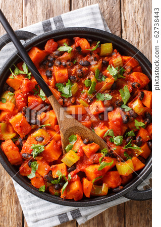 Roasted chili sweet potatoes and black beans with Roasted chili sweet potatoes and black beans with 62738443