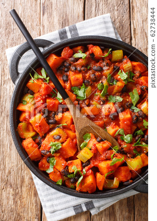 fried sweet potato black bean chili close-up in a 62738444