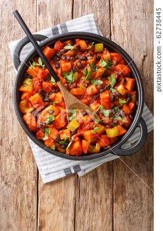 Vegetarian fried sweet potato black bean chili 62738445