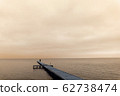 Silhouette of a lonely man on the bridge 62738474
