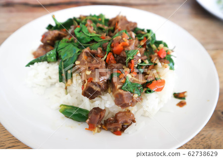 stir fried pork or stir beef with holy basil stir fried pork or stir beef with holy basil 62738629