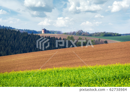Picturesque rural landscape with old windmill Picturesque rural landscape with old windmill 62738984