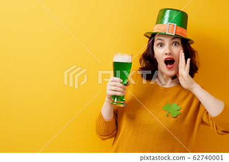woman in leprechaun hat woman in leprechaun hat 62740001