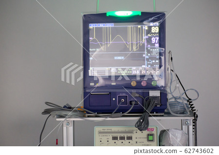Hospital electrocardiogram and medical equipment in operating room 62743602