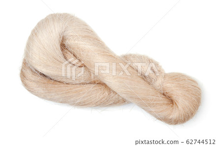 Raw flax fiber isolated on white. 62744512