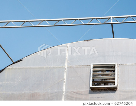 Large greenhouse building with the ventilators 62745204