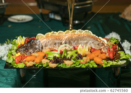 Baked salmon with a spicy crust Baked salmon with a spicy crust 62745560