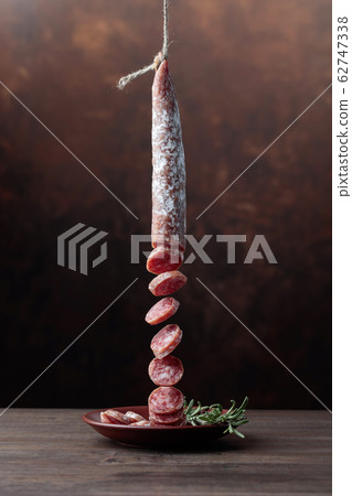 Homemade smoked salami. 62747338