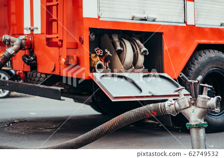 Fire Hydrant In Use During a Structure Fire 62749532