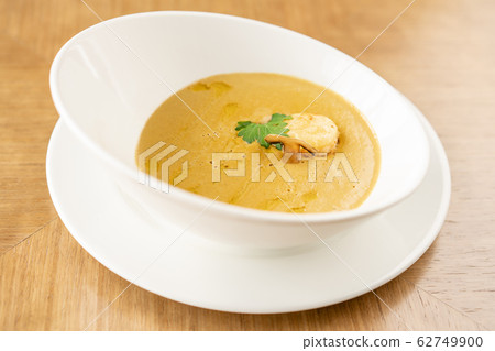 Cream-soup with porcini mushroom with croutons on wooden table. Restaurant menu Cream-soup with porcini mushroom with croutons on wooden table. Restaurant menu 62749900