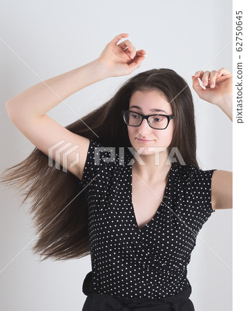 Bespectacled Teen Girl Bespectacled Teen Girl 62750645