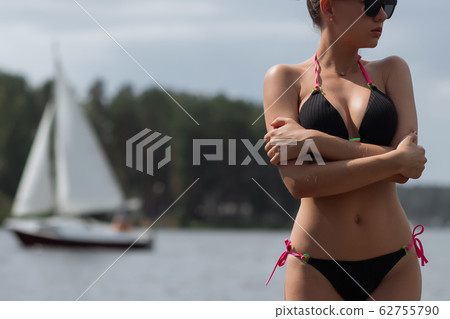 Woman in black bathing suit 62755790