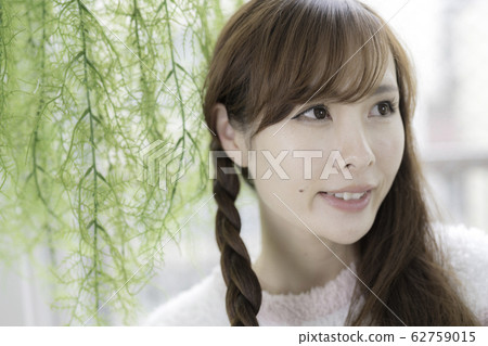 A young braid woman A young braid woman 62759015