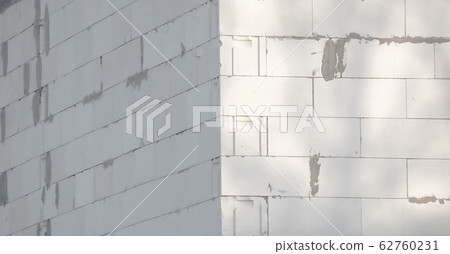Building a wall of gas silicate blocks. Building a wall of gas silicate blocks. 62760231