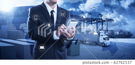 Businessman touching smartphone for analyze stock 62762537