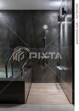 Trendy modern spa interior with tiled walls 62764309