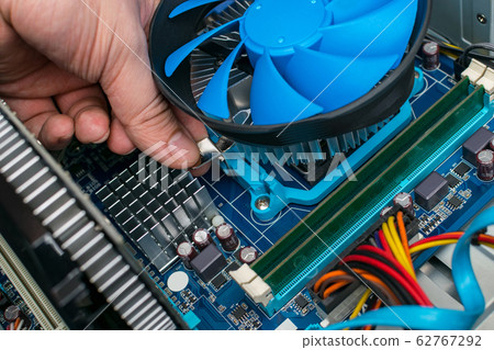 Computer repair, replacement of the processor cooling system. Maintenance of computer equipment 62767292
