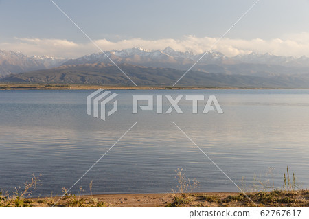 South shore of Issyk-kul lake in Kyrgyzstan. 62767617