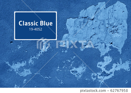 Old cracked calm wall. Painted texture background in monochrome color. Trendy blue and calm color. Banner Old cracked calm wall. Painted texture background in monochrome color. Trendy blue and calm color. Banner 62767958