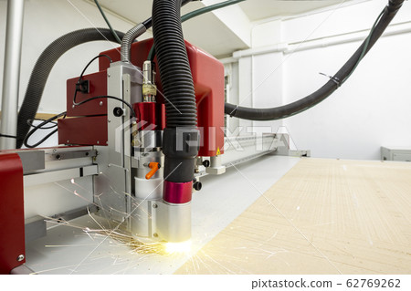 CNC laser cutting metal sheet with bright sparkle CNC laser cutting metal sheet with bright sparkle 62769262