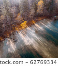 BELARUS, MINSK REGION - OCTOBER, 2019: Aerial drone photo of the lake Svityaz on sunset. 62769334