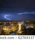 BELARUS, MINSK - MAY, 2019: Photo of the lightning striking in suburbs at spring night 62769337