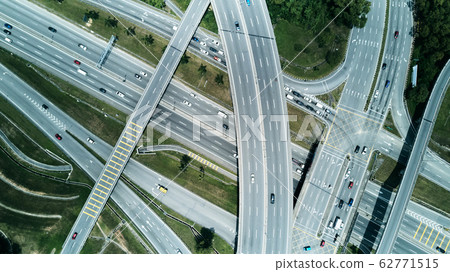 Aerial view of highway and overpass in city  located at Kuala Lumpur ,Malaysia . Aerial view of highway and overpass in city  located at Kuala Lumpur ,Malaysia . 62771515