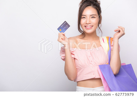 Woman, beauty, pretty, shopping, shopping, credit card Woman, beauty, pretty, shopping, shopping, credit card 62773979