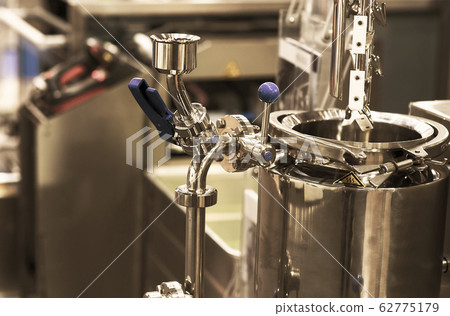 pharmaceutical industry. Production line machine conveyor at factory with bottles 62775179